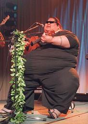 Israel Kamakawiwo'ole playing ukulele